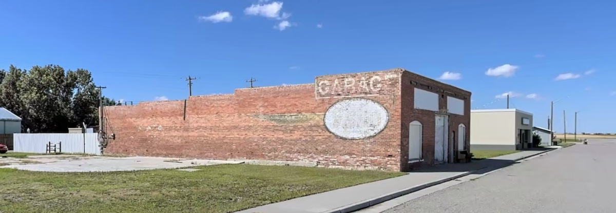 brick garage and gas station in granum